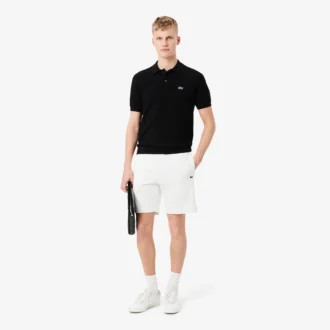 Pantaloncini in pile con striscia logo e vestibilità regolare