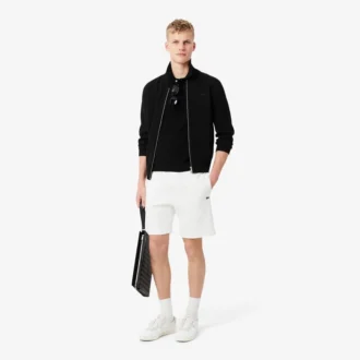 Pantaloncini in pile con striscia logo e vestibilità regolare