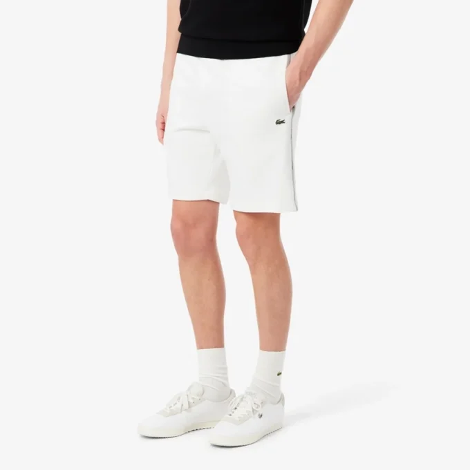 Pantaloncini in pile con striscia logo e vestibilità regolare