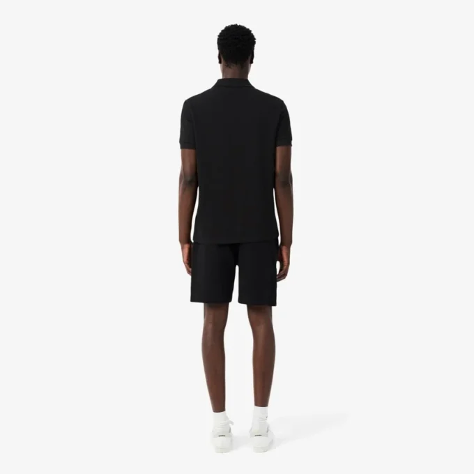 Pantaloncini in pile con striscia logo e vestibilità regolare Pantaloncini in pile con striscia logo e vestibilità regolare