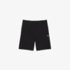 Pantaloncini in pile con striscia logo e vestibilità regolare Pantaloncini in pile con striscia logo e vestibilità regolare