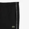 Pantaloncini in pile con striscia logo e vestibilità regolare Pantaloncini in pile con striscia logo e vestibilità regolare