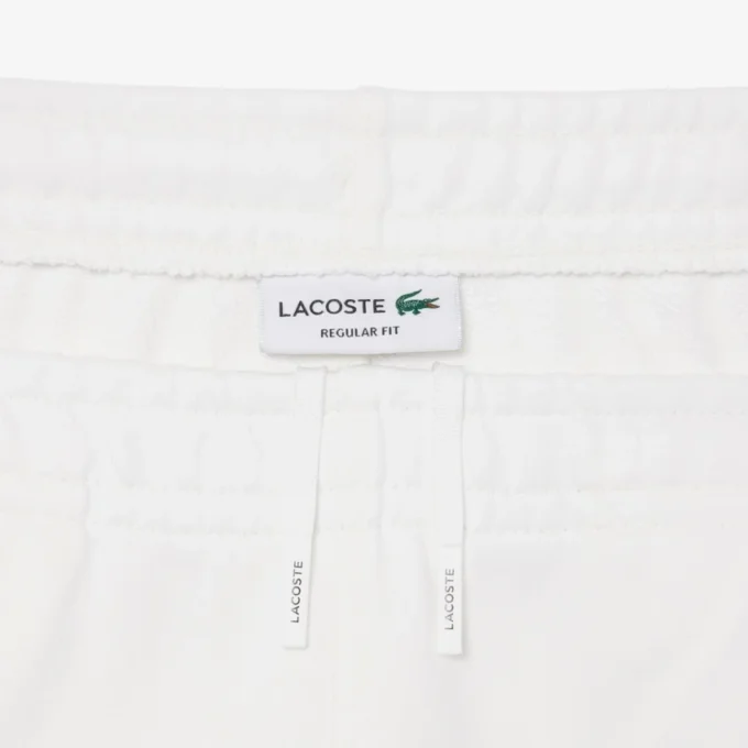 Pantaloncini in pile con striscia logo e vestibilità regolare