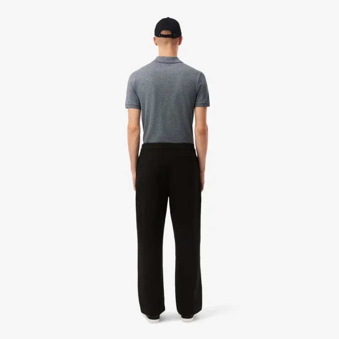 Pantaloni a pieghe in piqué da uomo dalla vestibilità ampia Pantaloni a pieghe in piqué da uomo dalla vestibilità ampia