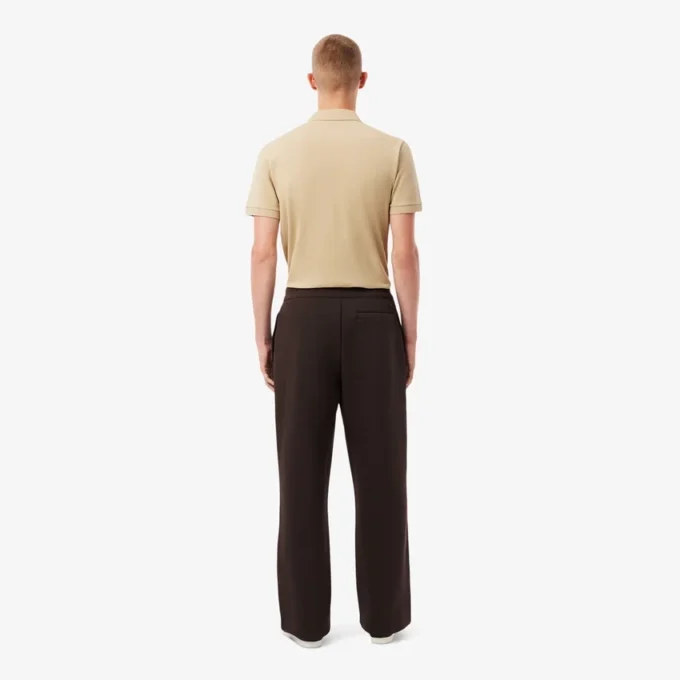 Pantaloni a pieghe in piqué da uomo dalla vestibilità ampia Pantaloni a pieghe in piqué da uomo dalla vestibilità ampia
