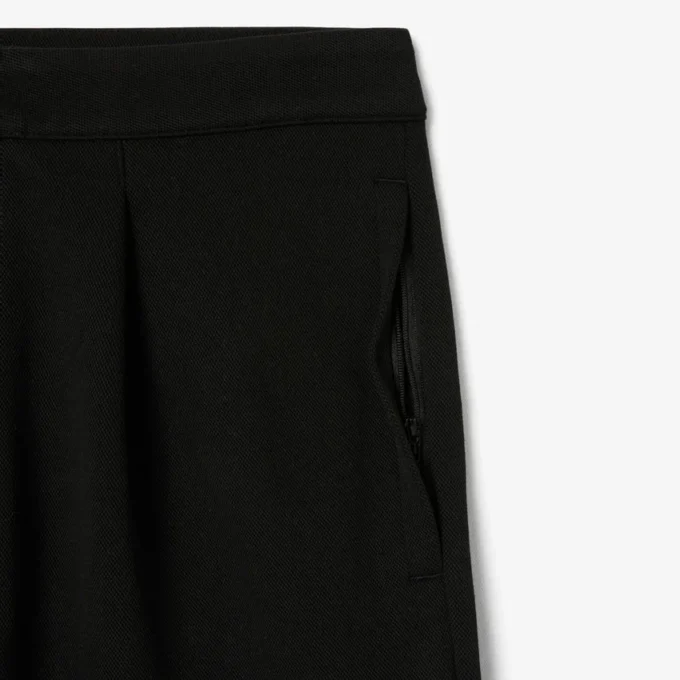 Pantaloni a pieghe in piqué da uomo dalla vestibilità ampia Pantaloni a pieghe in piqué da uomo dalla vestibilità ampia
