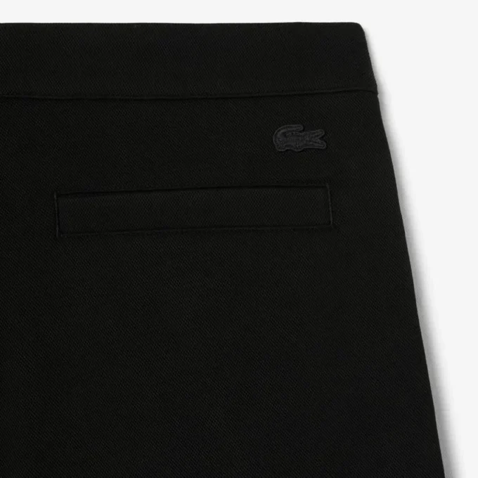 Pantaloni a pieghe in piqué da uomo dalla vestibilità ampia Pantaloni a pieghe in piqué da uomo dalla vestibilità ampia