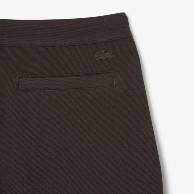 Pantaloni a pieghe in piqué da uomo dalla vestibilità ampia Pantaloni a pieghe in piqué da uomo dalla vestibilità ampia