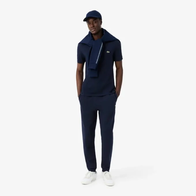Pantaloni da tuta con striscia e logo Pantaloni da tuta con striscia e logo