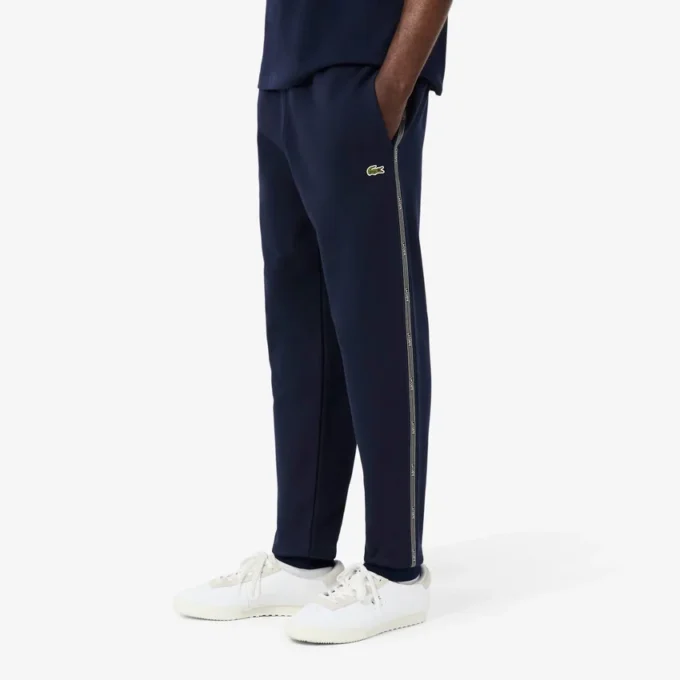 Pantaloni da tuta con striscia e logo Pantaloni da tuta con striscia e logo