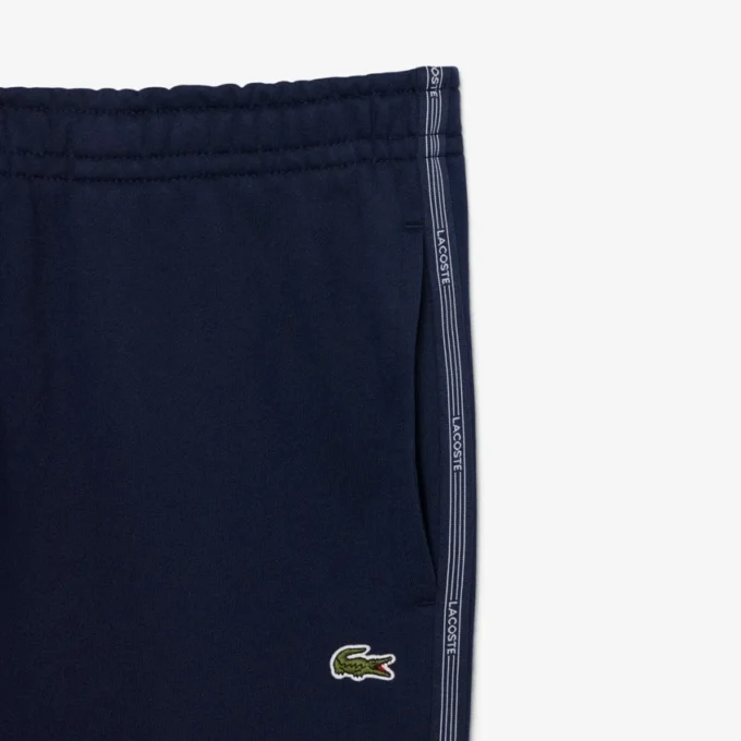 Pantaloni da tuta con striscia e logo Pantaloni da tuta con striscia e logo