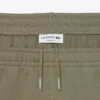 Pantaloni da tuta con striscia e logo Pantaloni da tuta con striscia e logo