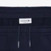 Pantaloni da tuta con striscia e logo Pantaloni da tuta con striscia e logo