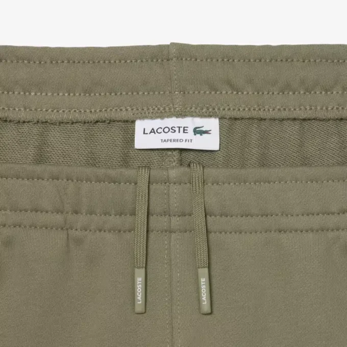 Pantaloni da tuta con striscia e logo Pantaloni da tuta con striscia e logo