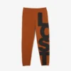 Pantaloni da tuta da uomo in cotone con scritte a contrasto Pantaloni da tuta da uomo in cotone con scritte a contrasto