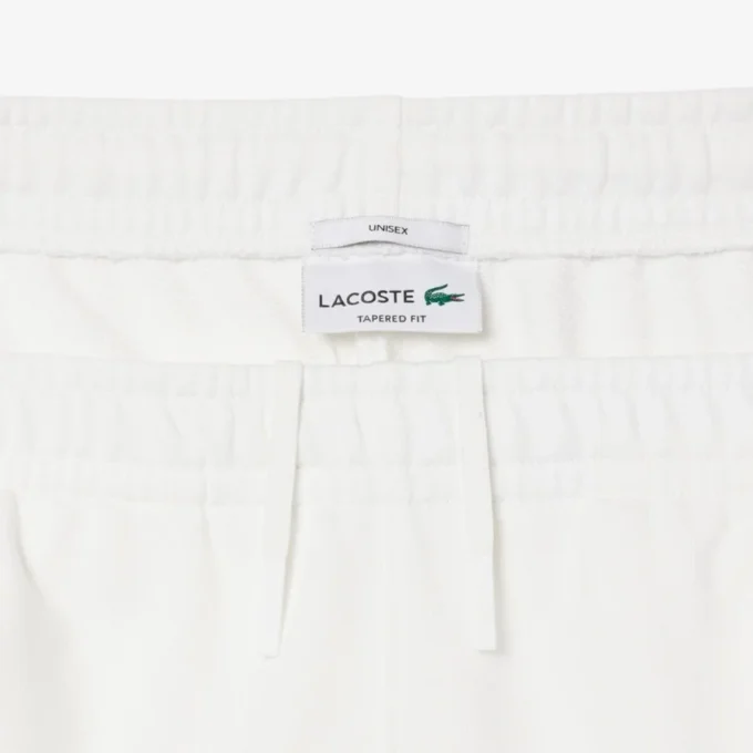 Pantaloni della tuta con marchio in rilievo Pantaloni della tuta con marchio in rilievo