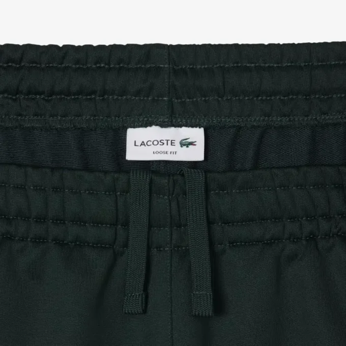 Pantaloni della tuta da uomo in raso a vestibilità ampia Pantaloni della tuta da uomo in raso a vestibilità ampia