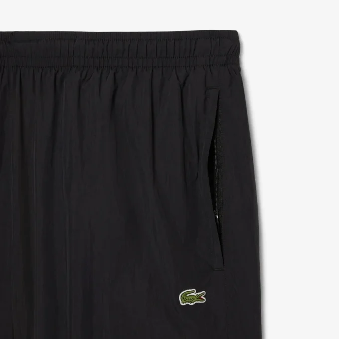 Pantaloni della tuta da uomo leggeri e idrorepellenti Pantaloni della tuta da uomo leggeri e idrorepellenti