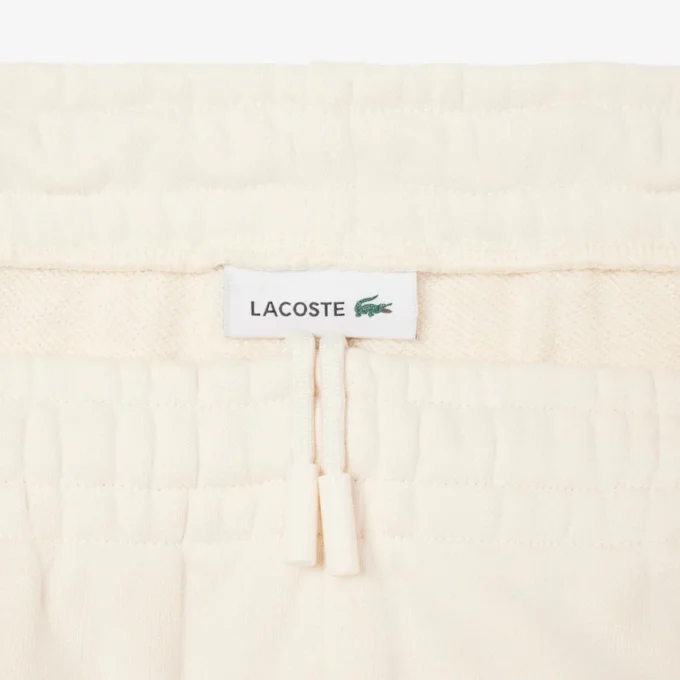 Pantaloni in pile da donna con logo in rilievo Pantaloni in pile da donna con logo in rilievo