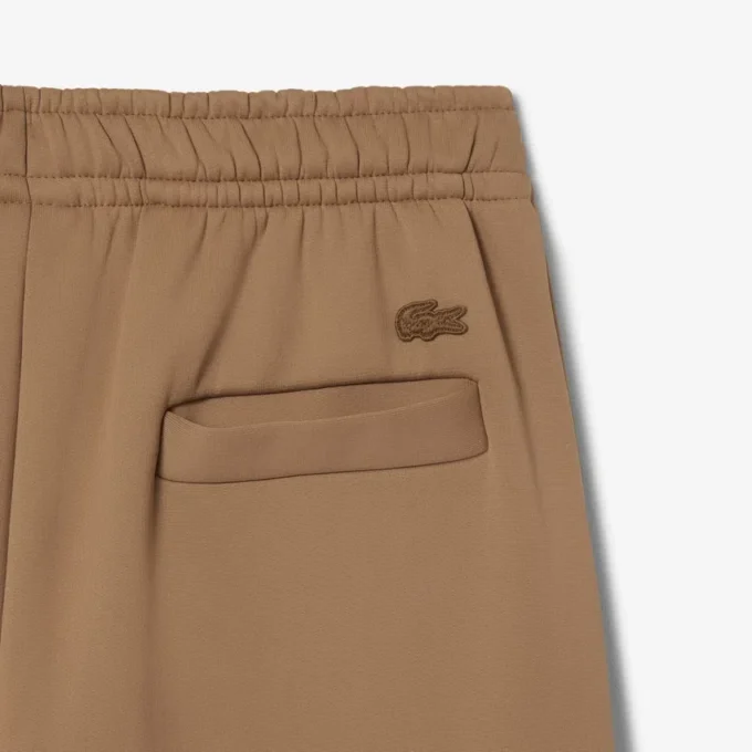 Pantaloni jogger in raso plissettato della collezione Runway Pantaloni jogger in raso plissettato della collezione Runway