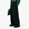 Pantaloni sartoriali in lana dal taglio ampio ispirati alle passerelle Pantaloni sartoriali in lana dal taglio ampio ispirati alle passerelle