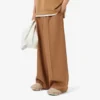 Pantaloni sartoriali in lana dal taglio ampio ispirati alle passerelle Pantaloni sartoriali in lana dal taglio ampio ispirati alle passerelle