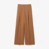 Pantaloni sartoriali in lana dal taglio ampio ispirati alle passerelle Pantaloni sartoriali in lana dal taglio ampio ispirati alle passerelle