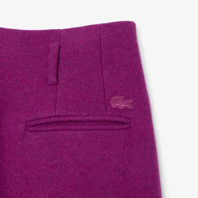 Pantaloni sartoriali in lana fiammata dal taglio ampio della collezione Runway Pantaloni sartoriali in lana fiammata dal taglio ampio della collezione Runway