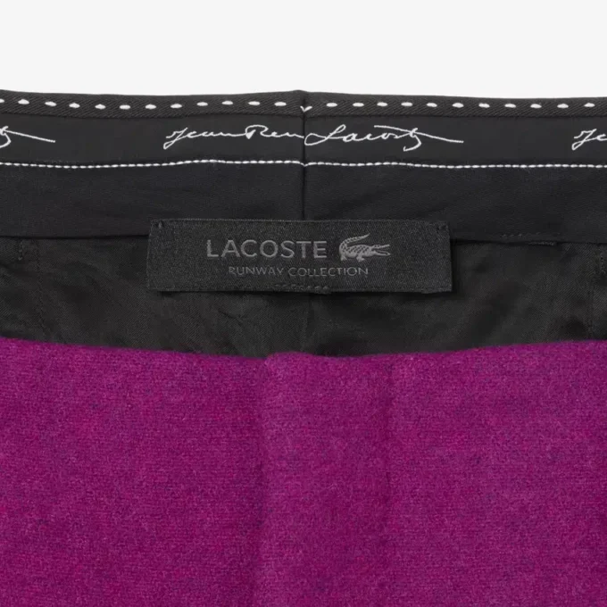 Pantaloni sartoriali in lana fiammata dal taglio ampio della collezione Runway Pantaloni sartoriali in lana fiammata dal taglio ampio della collezione Runway