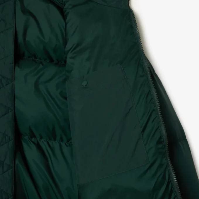 Piumino da donna con cappuccio e vestibilità comoda Piumino da donna con cappuccio e vestibilità comoda
