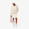 Piumino da donna con cappuccio e vestibilità comoda Piumino da donna con cappuccio e vestibilità comoda