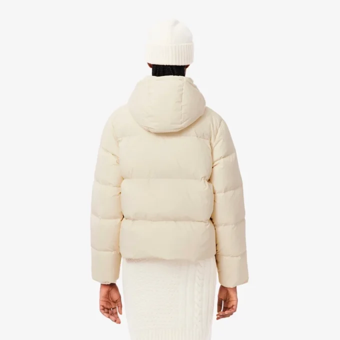 Piumino da donna con cappuccio e vestibilità comoda Piumino da donna con cappuccio e vestibilità comoda