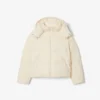 Piumino da donna con cappuccio e vestibilità comoda Piumino da donna con cappuccio e vestibilità comoda