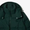 Piumino da donna con cappuccio e vestibilità comoda Piumino da donna con cappuccio e vestibilità comoda