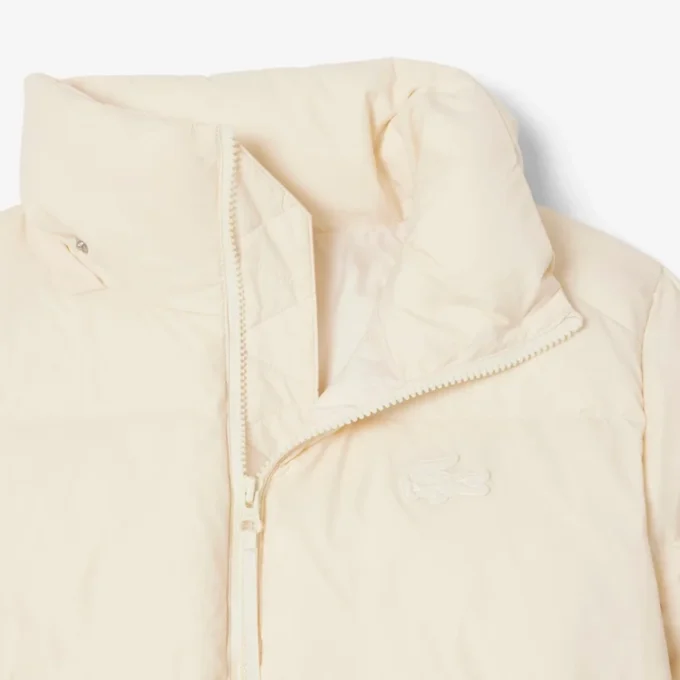 Piumino da donna con cappuccio e vestibilità comoda Piumino da donna con cappuccio e vestibilità comoda