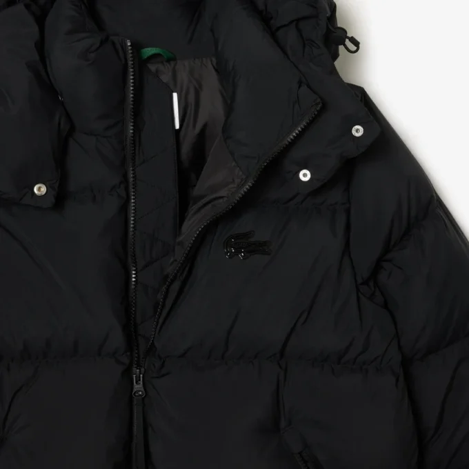 Piumino da donna con cappuccio e vestibilità comoda Piumino da donna con cappuccio e vestibilità comoda