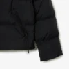 Piumino da donna con cappuccio e vestibilità comoda Piumino da donna con cappuccio e vestibilità comoda