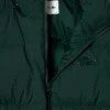 Piumino da donna con cappuccio e vestibilità comoda Piumino da donna con cappuccio e vestibilità comoda