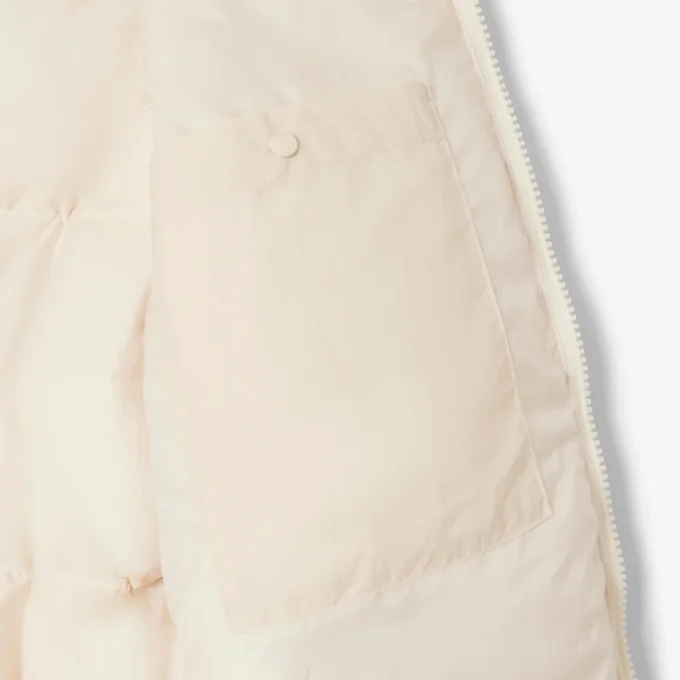 Piumino da donna con cappuccio e vestibilità comoda Piumino da donna con cappuccio e vestibilità comoda