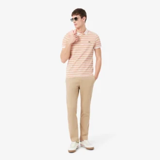 Polo a righe in petit piqué con vestibilità classica