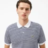 Polo a righe Petit Piqué L.12.12 da uomo, vestibilità classica Polo a righe Petit Piqué L.12.12 da uomo, vestibilità classica