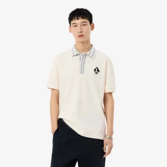 Polo con badge dalla vestibilità classica, prodotta in Francia