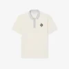 Polo con badge dalla vestibilità classica, prodotta in Francia Polo con badge dalla vestibilità classica, prodotta in Francia
