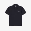 Polo con badge dalla vestibilità classica, prodotta in Francia Polo con badge dalla vestibilità classica, prodotta in Francia