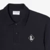 Polo con badge dalla vestibilità classica, prodotta in Francia Polo con badge dalla vestibilità classica, prodotta in Francia