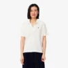 Polo da donna in piqué dalla vestibilità comoda Polo da donna in piqué dalla vestibilità comoda