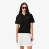 Polo da donna in piqué dalla vestibilità comoda Polo da donna in piqué dalla vestibilità comoda