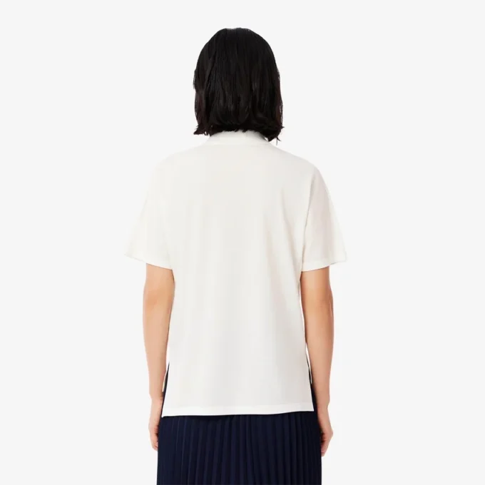 Polo da donna in piqué dalla vestibilità comoda Polo da donna in piqué dalla vestibilità comoda