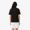 Polo da donna in piqué dalla vestibilità comoda Polo da donna in piqué dalla vestibilità comoda