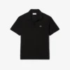 Polo da donna in piqué dalla vestibilità comoda Polo da donna in piqué dalla vestibilità comoda